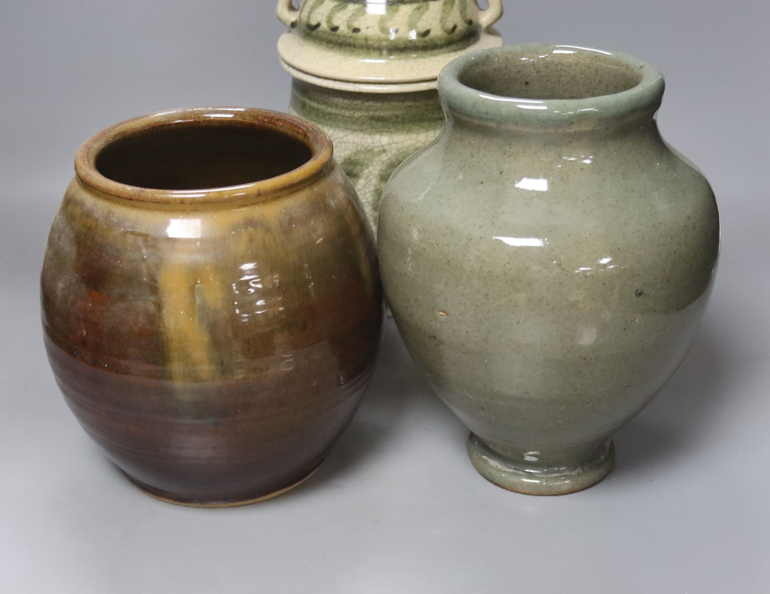 Andrew Rudebeck. A studio glass jar and cover, 22cm, and three further studio pottery jars